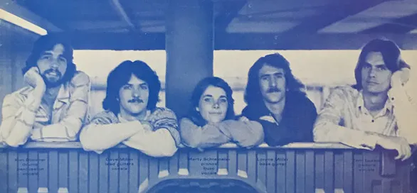 Vintage reel-to-reel tape recorder with analog audio reels